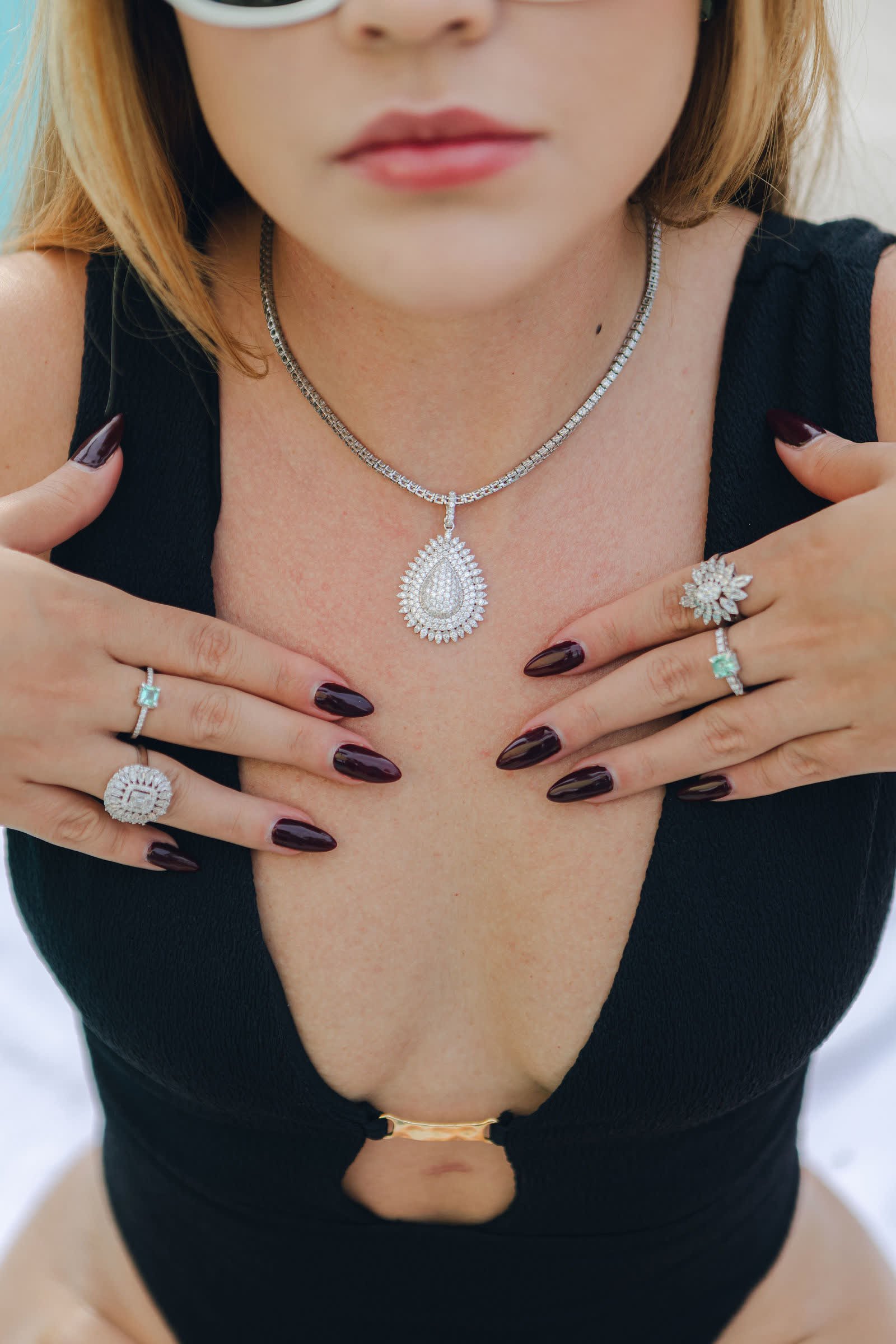 Sunburst Ring — A rosette of marquise diamonds around a brilliant.