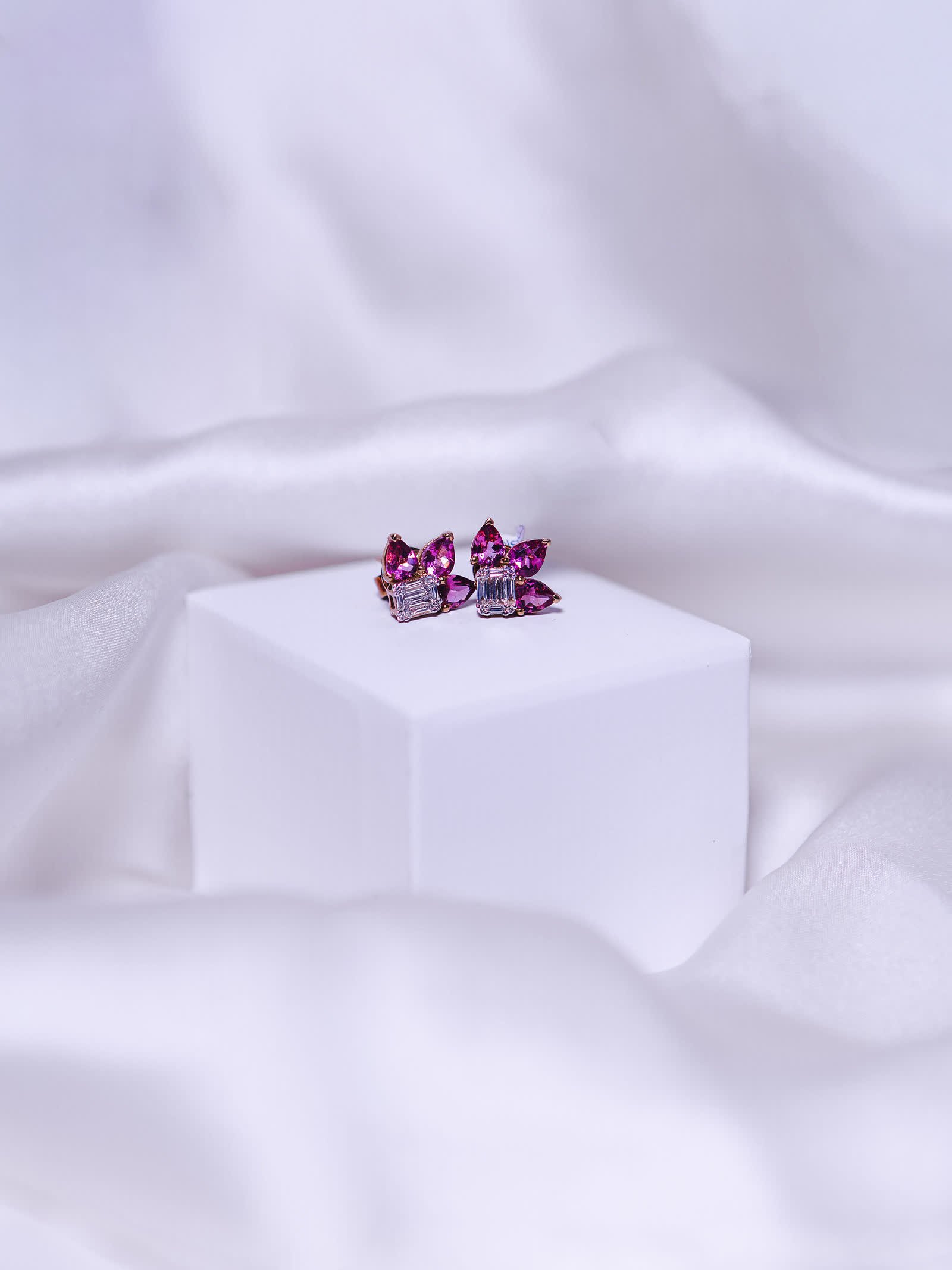 Pink Sapphire Earrings — Marquise pink sapphires alternating with baguettes.