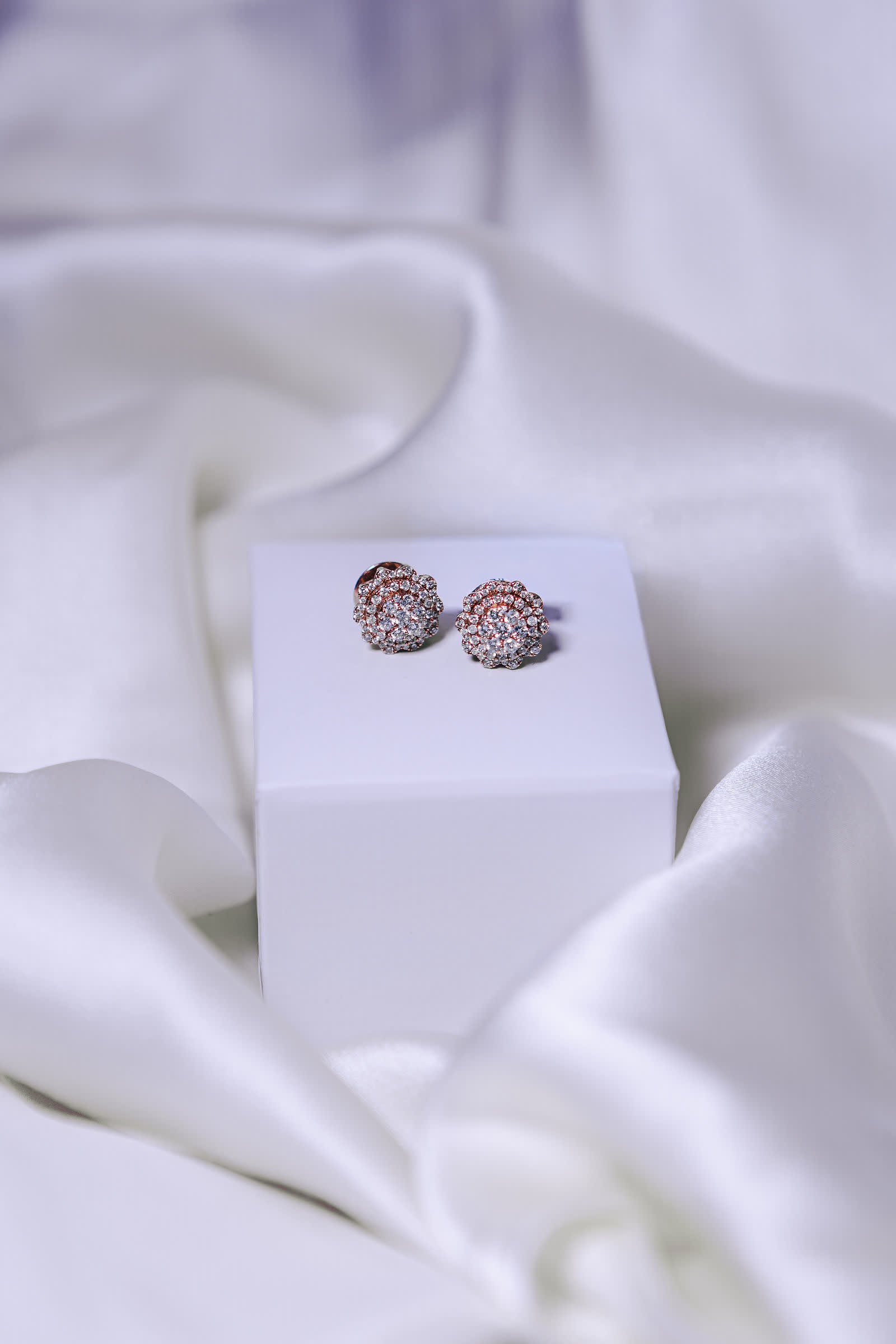 Rosé Earrings — Round buttons in rosé pavé.